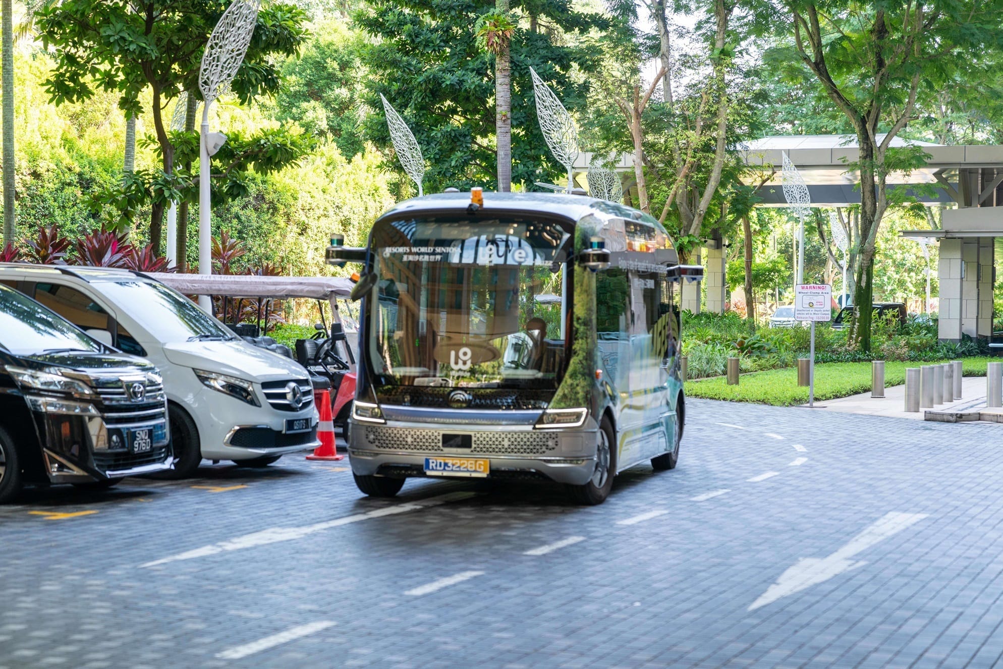 A WeRide bus on the road in Sentosa
